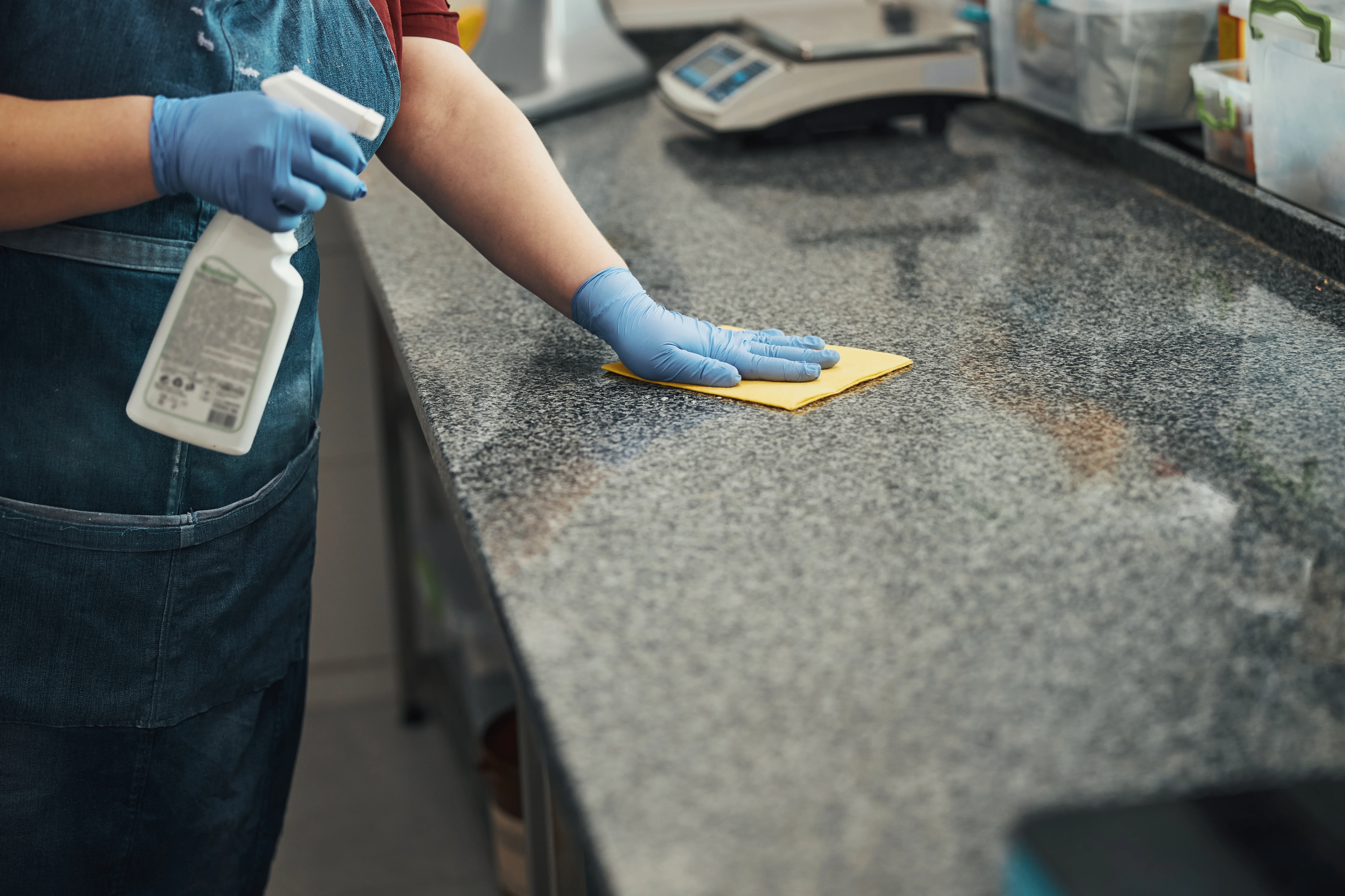 Cleaning and disinfecting countertops during post construction cleaning of a commercial property